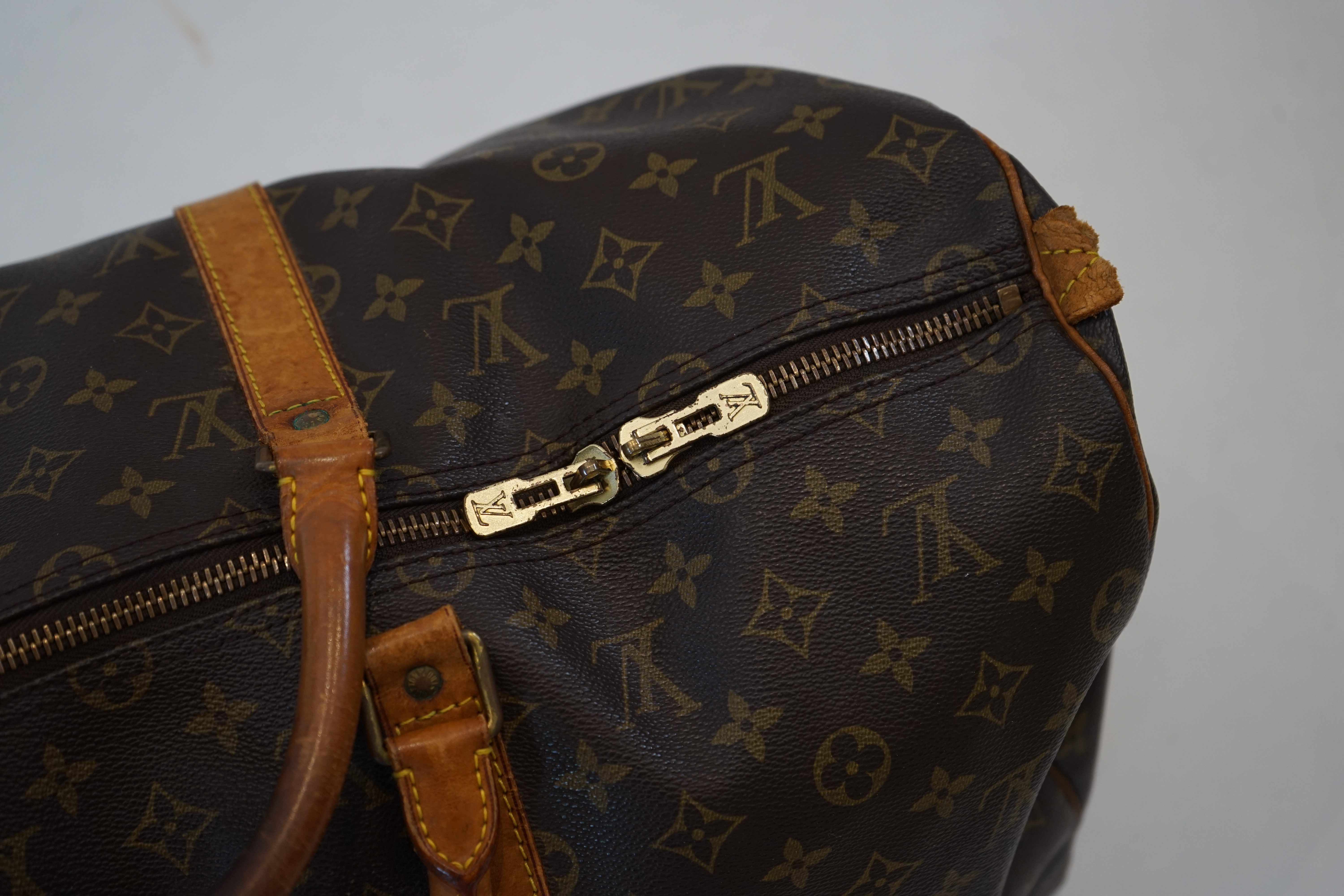 A Louis Vuitton Speedy 40 bag width 22cm, length 51cm, height 28cm